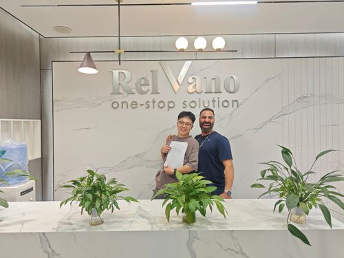 Relvano and overseas partner inspecting custom kitchen cabinet samples