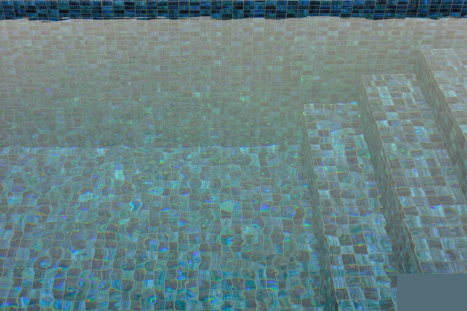 Swimming pool tiling